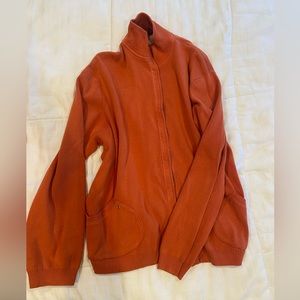 Orange zippered Chicos sweatshirt